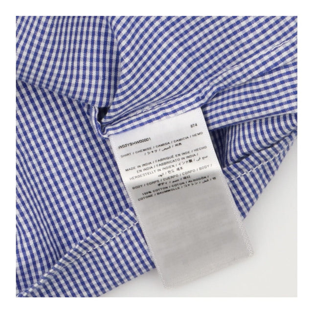 Blue and white check shirt