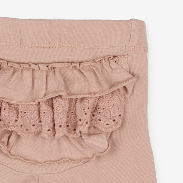 Dusky pink leggings with ruffle bottom