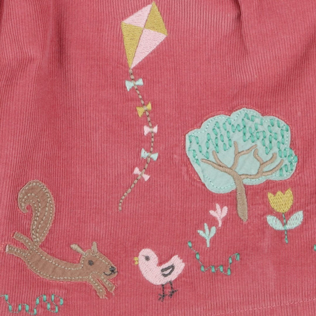 Cord pink dress with woodland applique