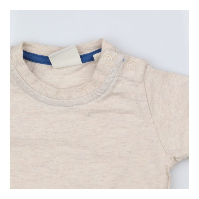 Tee SS cream marl popper shoulder
