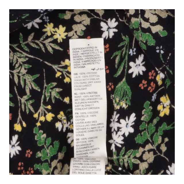 Blouse black with yellow florals