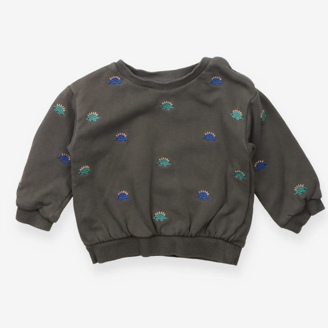 Khaki sweater embroidered dinosaurs