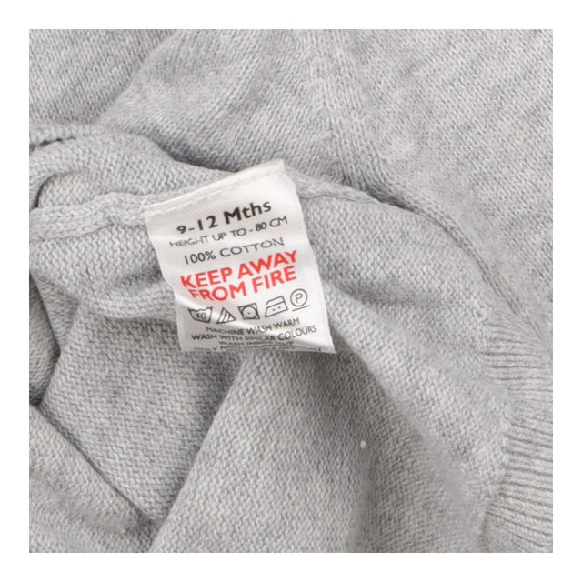 Grey knit cardigan with doves