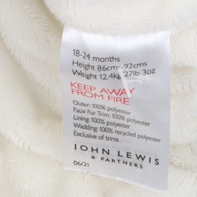Coat cream with pastel flowers