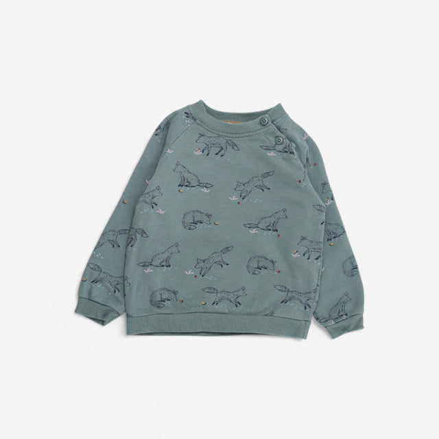Green playful fox sweater