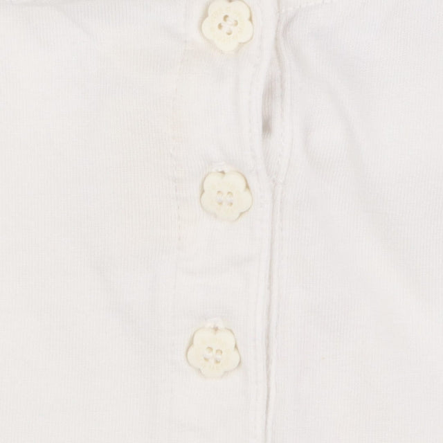 White t-shirt with giraffe and floral collar