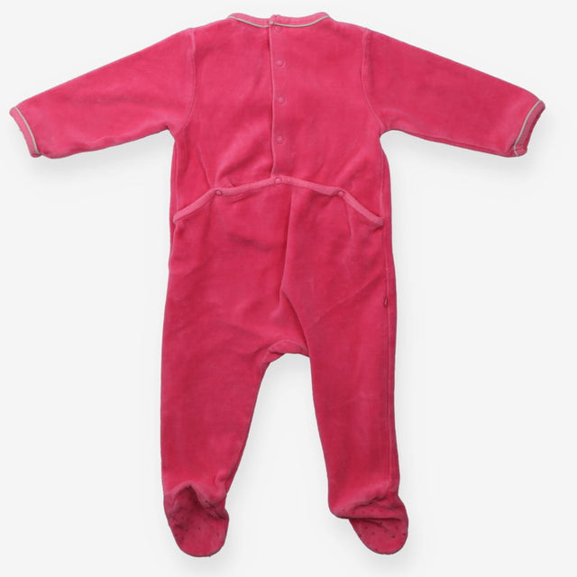 Pink velour sleepsuit with white fox