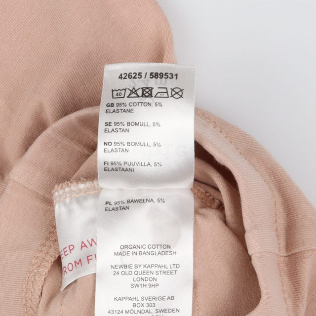 Dusky pink leggings with ruffle bottom