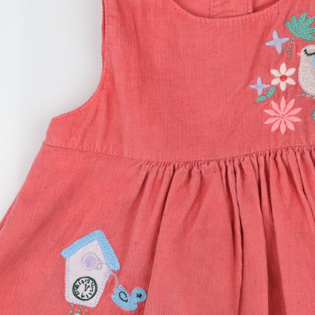 Pink cord dress with bunnies and birds