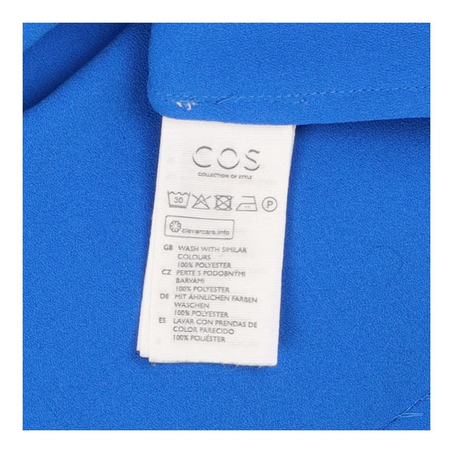 Cobalt blue long sleeve tie neck blouse