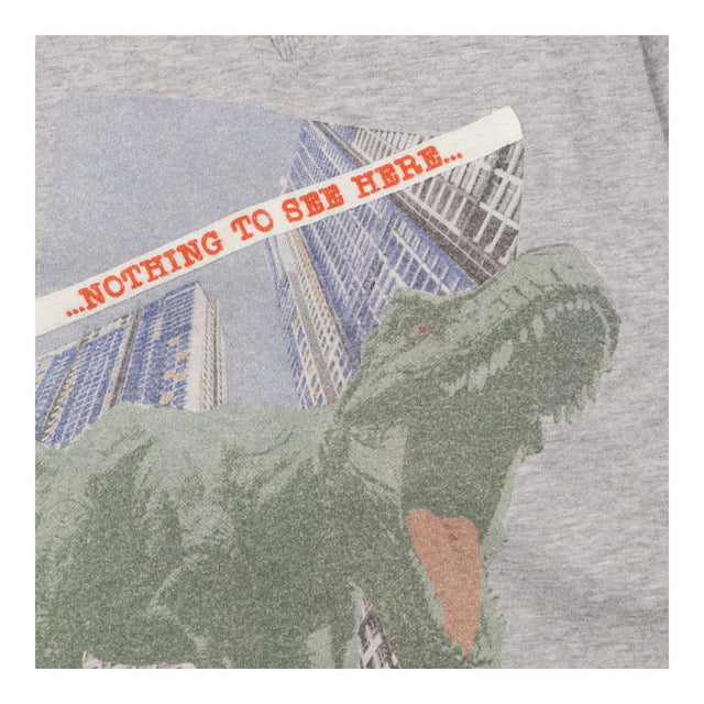 Grey long sleeve t-shirt with sky scraper dino