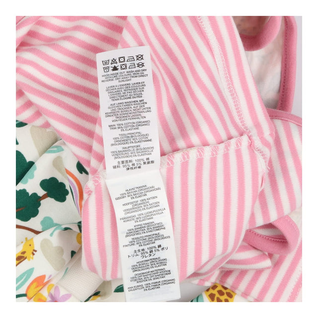 Easy dressing babygrow giraffes stripes and rainbo