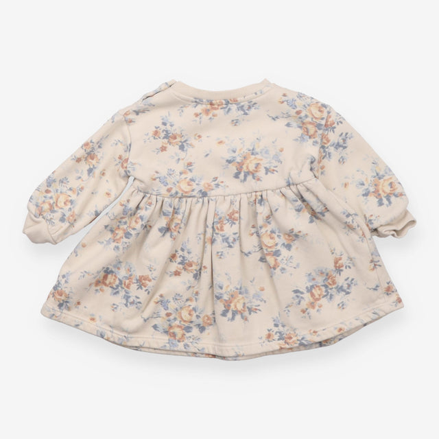 Beige sweater dress with blue floral print