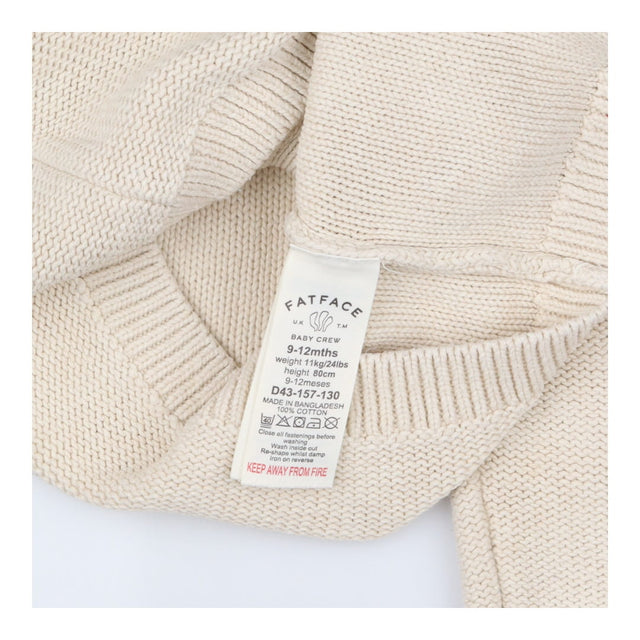 Cream knitted cardigan with owls