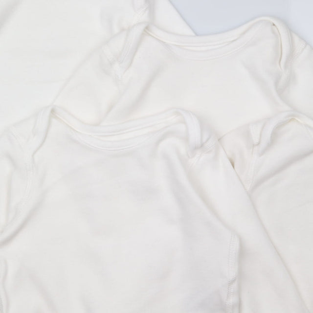 White long sleeve 4pc bodysuits