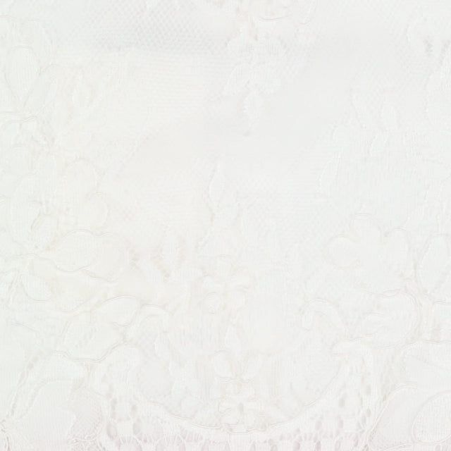 White lace dress with pink rose tulle skirt