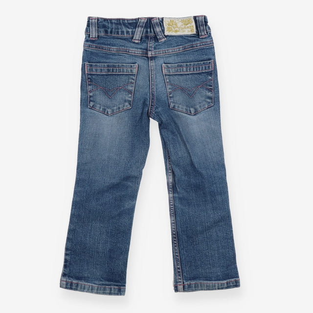Blue denim jeans pink stitching