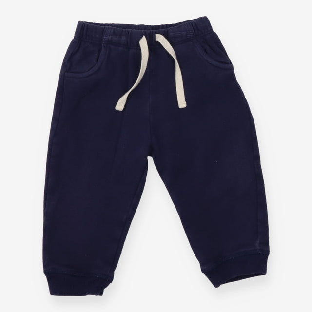 Navy joggers with white drawstring