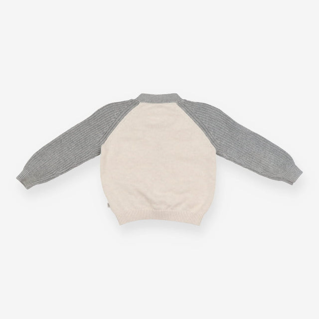 Cardigan grey sleeves cream body orange edging