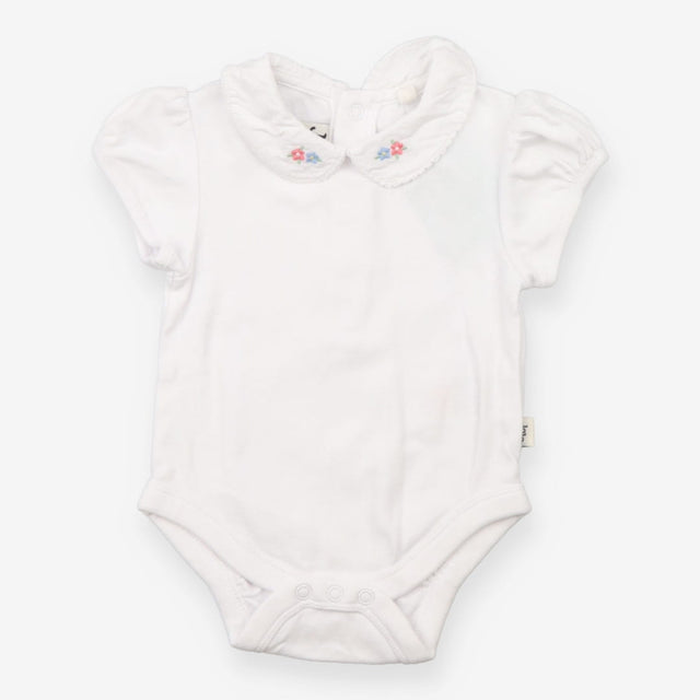White collared bodysuit with blue and pink flowers