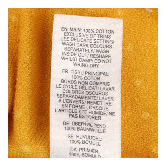 Dress yellow cord spot LS button through