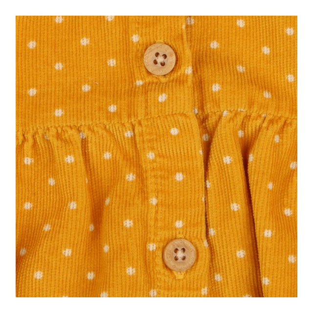 Dress yellow cord spot LS button through