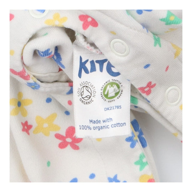 Romper Long Sleeved White Primary Flowers