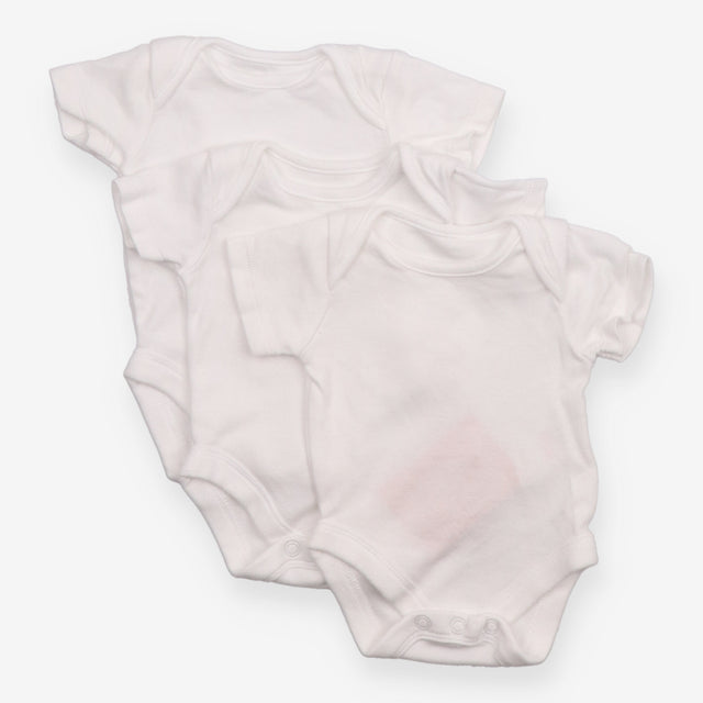 3 tiny baby white bodysuits