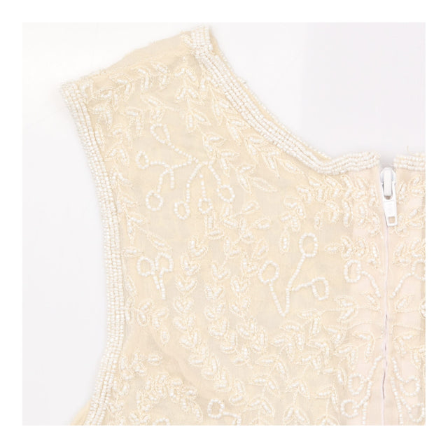 Ivory Floral Beaded Sleeveless Occasion Top