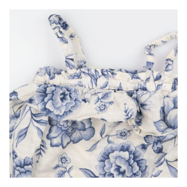 Romper white linen blue flowers