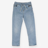 Pull on light wash jeans with glitter toggles