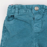 Turquoise cord trousers