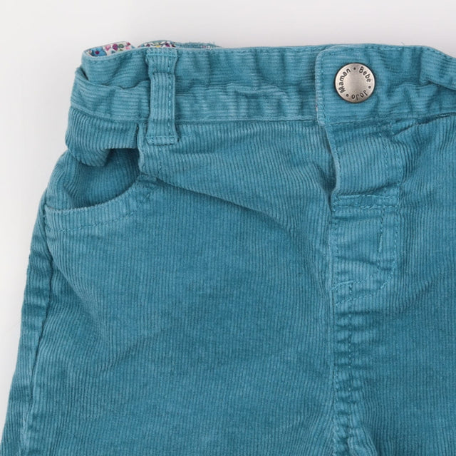 Turquoise cord trousers
