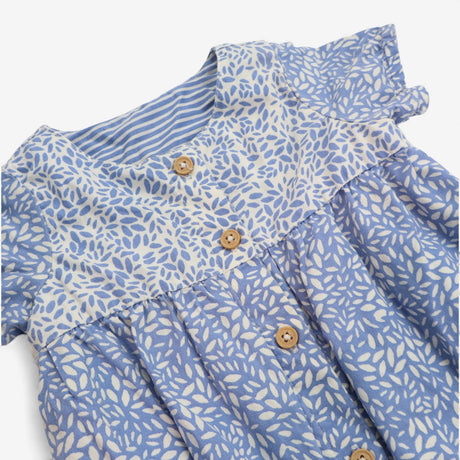 Romper blue and white leaf pattern with wood effec