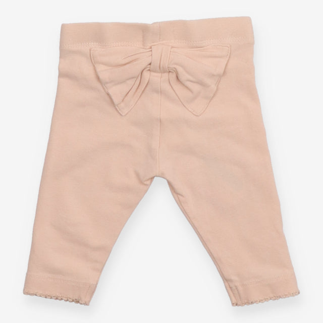 Legging Peach with ruffle bottom and Bow in the ba