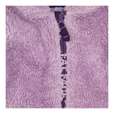 Purple fuzzy zip up onesie
