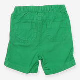 Green shorts white blue tie