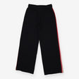 Black wide leg joggers with vivid rainbow stripe d