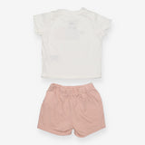White t-shirt with pink shorts