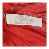 Coral red floral print long sleeve top with pocket