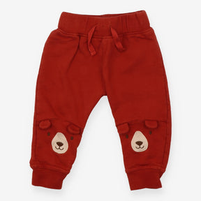 Jogger Rust Orange with Bear face on Knees