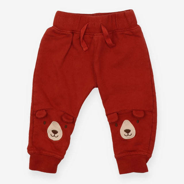 Jogger Rust Orange with Bear face on Knees