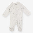 White zip muslin sleepsuit with blue stars