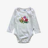 White vegetable bodysuit