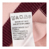 Pink deer jumper with burgundy trim