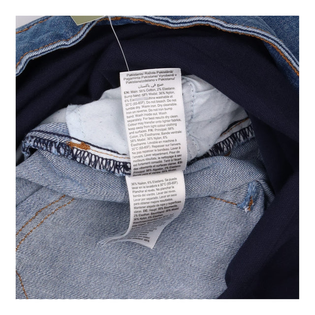 Blue Over-Bump Maternity Jeans With Distressed Kne