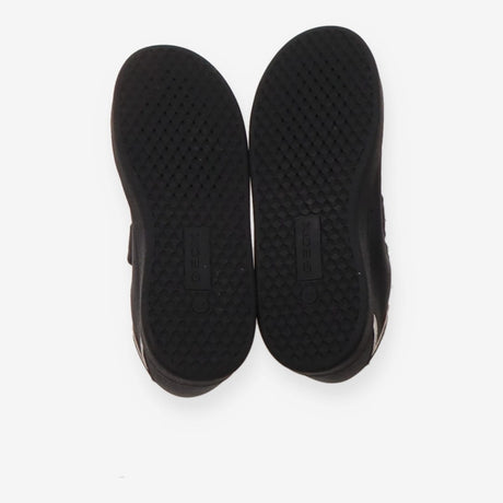 Trainers black white marks on heel velcro