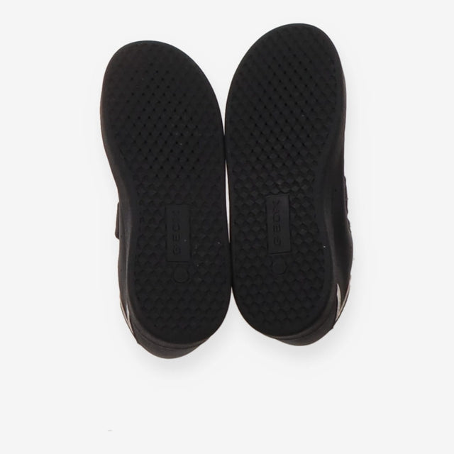Trainers black white marks on heel velcro