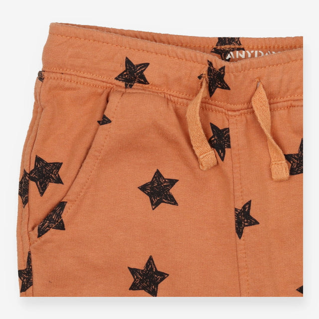 Brown drawstring jogger with black sketch stars