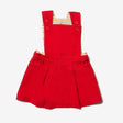 Red twill pinafore dress
